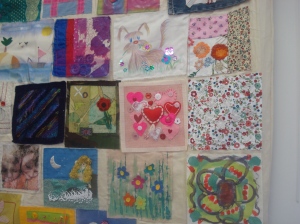 Close-up of the Patch Project artwork, featuring patches made by adult learners from York