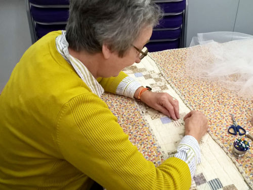 Betsy Cope Quilt being conserved