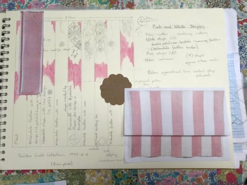 Sketchbook on Pink and White Strippy Quilt